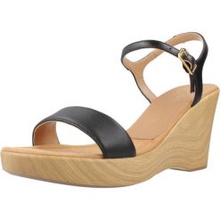 Sandały UNISA RITA NTO Czarny. Czarne sandały damskie Unisa, bez wzorów, ze skóry, bez obcasa. Za 354.99 zł.