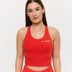 Top damski fitness krótki tangerine BEAT. Brązowe topy sportowe damskie GYMBEAM, xl, bez wzorów, z elastanu, bez ramiączek. Za 85.90 zł.