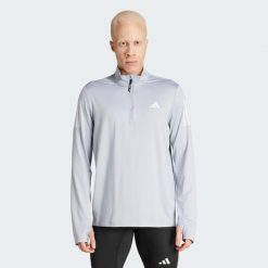 Bluza Own The Run Half-Zip. Białe bluzy bez kaptura męskie Adidas, m. Za 219.00 zł.