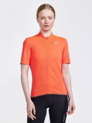 Craft Koszulka kolarska "Core Endur Lumen" w kolorze pomarańczowym rozmiar: L. Pomarańczowe bluzki sportowe damskie Craft, l, bez kołnierzyka, bez ramiączek. Za 130.99 zł.