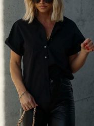 LA Angels Bluzka w kolorze czarnym rozmiar: M. Czarne bluzki damskie LA Angels, m, bez wzorów, z bawełny, bez kołnierzyka, bez ramiączek. Za 175.67 zł.