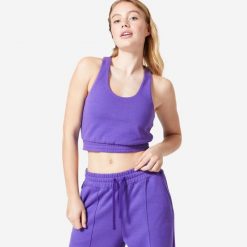 Koszulka bez rękawów damska Domyos Gym & Pilates 520 Crop. Fioletowe bluzki sportowe damskie DOMYOS, m, bez wzorów, z bawełny, bez ramiączek. Za 99.99 zł.