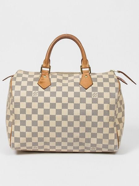 Louis Vuitton Torebka "Speedy 30" w kolorze biało-szarym - 30 x 21 x 18 cm rozmiar: onesize. Białe torebki klasyczne damskie Louis Vuitton, w ażurowe wzory, z materiału, bez dodatków. Za 3,768.92 zł.