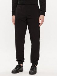 Calvin Klein Spodnie dresowe Color Embossed Logo K10K112688 Czarny Regular Fit. Czarne spodnie dresowe męskie CALVIN KLEIN, bez wzorów, z bawełny. Za 399.99 zł.