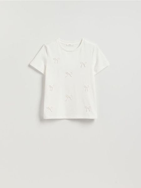 T-shirt z kokardkami - biały. Białe t-shirty damskie Reserved, l, bez wzorów, z bawełny, bez kołnierzyka. Za 69.99 zł.