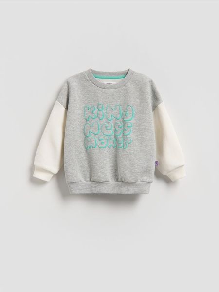 Bawełniana bluza oversize - jasnoszary. Szare bluzy i bluzki niemowlęce Reserved, bez wzorów, z bawełny, bez ramiączek, bez kaptura. Za 49.99 zł.