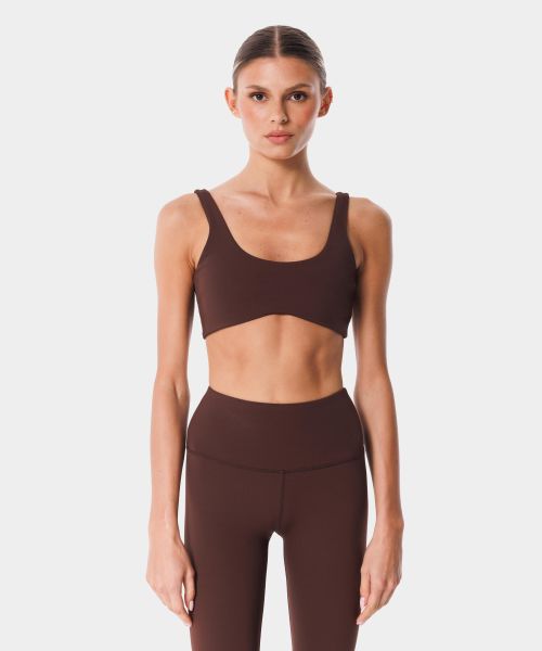 Biustonosz sportowy z regulacją Carpatree Balletcore. Brązowe biustonosze sportowe damskie Carpatree, bez wzorów, z dzianiny. Za 111.99 zł.