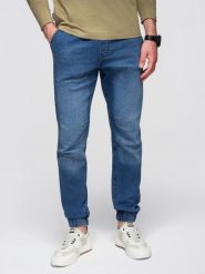 Męskie spodnie JOGGERY jeansowe z efektem sprania - niebieskie V2. Niebieskie spodnie materiałowe męskie Ombre Clothing, z aplikacjami, z bawełny, eleganckie. Za 239.99 zł.