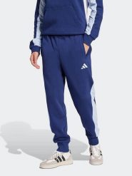 Adidas Spodnie dresowe w kolorze granatowym rozmiar: XL. Niebieskie spodnie dresowe męskie Adidas, bez wzorów, z dresówki. Za 134.85 zł.