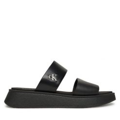 Klapki Calvin Klein Jeans. Czarne klapki damskie Calvin Klein Jeans, bez wzorów, z jeansu, bez obcasa. Za 279.99 zł.