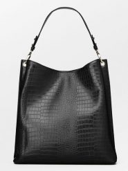 Becksöndergaard Torebka "Kayna" w kolorze czarnym - 35 x 36,5 cm rozmiar: onesize. Czarne torebki klasyczne damskie Becksöndergaard, bez wzorów, z materiału, bez dodatków. Za 217.99 zł.