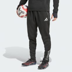 Spodnie Tiro 25 Competition Winterized. Czarne spodnie dresowe męskie Adidas, bez wzorów, z dresówki. Za 279.00 zł.