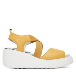 Sandały Fly London. Żółte sandały damskie Fly London, bez wzorów, bez obcasa, na koturnie. Za 547.99 zł.