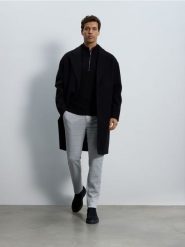 Spodnie chino slim fit w kratę - jasnoszary. Szare spodnie materiałowe męskie Reserved, bez wzorów, z dzianiny. W wyprzedaży za 59.99 zł.