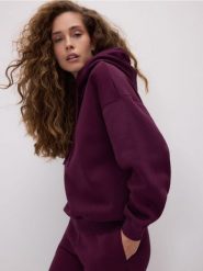 Gładka bluza z bawełną - ciemnofioletowy. Fioletowe bluzy bez kaptura damskie Reserved, l, z bawełny. Za 129.99 zł.