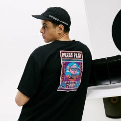 Koszulka oversize unisex Decathlon z grafiką Yeye Weller. Czarne t-shirty damskie Decathlon, s, bez wzorów, z bawełny, bez kołnierzyka. Za 69.99 zł.