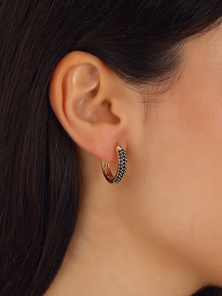 Nakkash Pozłacane kolczyki-kreole z cyrkoniami rozmiar: onesize. Żółte kolczyki damskie Nakkash, z cyrkonią, pozłacane. Za 47.94 zł.