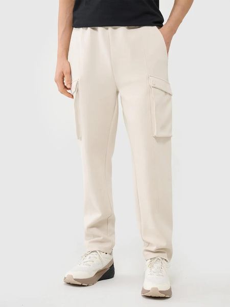 SPODNIE MĘSKIE 4F CASUAL CARGO L TTROM0990. Brązowe spodnie materiałowe męskie 4f, bez wzorów, casualowe. Za 169.99 zł.