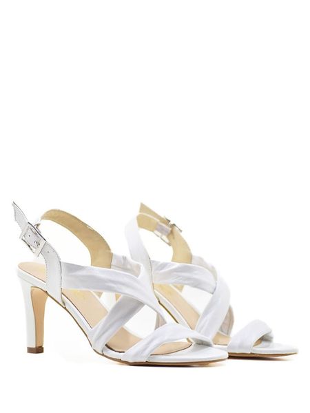 ELODIE Skórzane sandały w kolorze białym rozmiar: 41. Białe sandały damskie ELODIE, bez wzorów, ze skóry, bez obcasa, na koturnie. Za 187.45 zł.