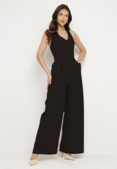 Czarny Kombinezon Taliowany Ozdobiony Guzikami Niladwenna. Czarne kombinezony damskie Born2be, m, bez wzorów, eleganckie, bez kołnierzyka, bez ramiączek. Za 129.99 zł.