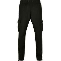 Spodnie Urban Classics z bawełny ripstop. Czarne spodnie materiałowe męskie Urban Classics, bez wzorów, z bawełny. Za 212.35 zł.