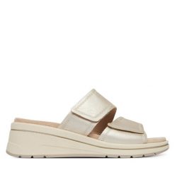 Klapki Caprice. Żółte klapki damskie Caprice, bez wzorów, bez obcasa. Za 299.99 zł.