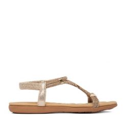 Sandały JENNY. Żółte sandały damskie Jenny, bez wzorów, bez obcasa, na płaskiej podeszwie. Za 99.99 zł.