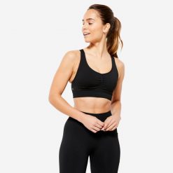 Stanik sportowy Decathlon. Czarne biustonosze sportowe damskie DOMYOS, bez wzorów, ze skóry. Za 89.99 zł.