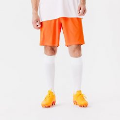 Spodenki piłkarskie Kipsta Essential. Brązowe szorty damskie KIPSTA, bez wzorów, z materiału, sportowe. Za 29.99 zł.
