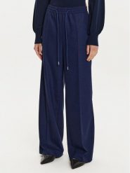 BOSS Spodnie dresowe Tavite1 50528604 Granatowy Relaxed Fit. Niebieskie spodnie dresowe damskie Boss, bez wzorów, z dresówki. Za 759.99 zł.