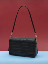 Torebka - czarny. Czarne torebki klasyczne damskie Sinsay, bez wzorów, bez dodatków. W wyprzedaży za 24.99 zł.