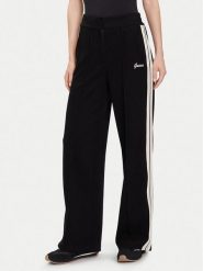 Guess Spodnie dresowe V5BB16 KCX52 Czarny Wide Leg. Czarne spodnie dresowe damskie Guess, m, z aplikacjami, z dresówki. Za 249.99 zł.