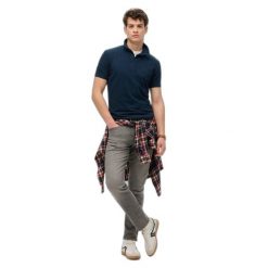 Koszulka polo z dżerseju Superdry Essential. Niebieskie koszulki polo męskie Superdry., na lato, m, bez wzorów, z dżerseju, bez ramiączek. Za 168.30 zł.