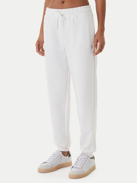 Guess Spodnie dresowe V6GB11 K3095 Biały Regular Fit. Białe spodnie dresowe damskie Guess, m, z aplikacjami, z dresówki. Za 294.99 zł.