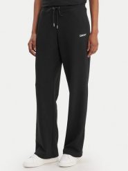 DKNY Sport Spodnie dresowe DP6P3794 Czarny Regular Fit. Czarne spodnie dresowe damskie DKNY Sport, s, bez wzorów, z dresówki. Za 309.99 zł.