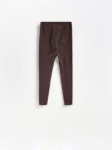 Gładkie legginsy - ciemnobrązowy. Brązowe legginsy damskie Reserved, l, bez wzorów, z dzianiny. Za 89.99 zł.