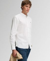 Superdry Klasyczna koszula Oxford z długim rękawem z bawełny organicznej. Białe koszule damskie Superdry., xl, bez wzorów, z bawełny, bez kołnierzyka, bez ramiączek. Za 324.25 zł.