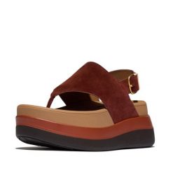 Kobiece zamszowe sandały na koturnie z tylnym zapięciem FitFlop F-Mode. Brązowe sandały damskie FIT FLOP, bez wzorów, z materiału, bez obcasa, na koturnie. Za 617.00 zł.