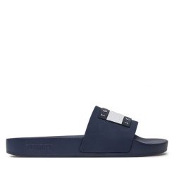 Klapki Tommy Jeans. Niebieskie klapki damskie Tommy Jeans, bez wzorów, z jeansu, bez obcasa. Za 219.99 zł.