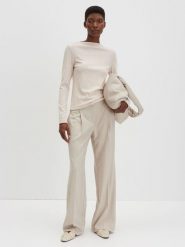 Someday Koszulka "Kelea" w kolorze kremowym rozmiar: 40. Brązowe bluzki damskie Someday, bez wzorów, bez kołnierzyka. Za 95.99 zł.