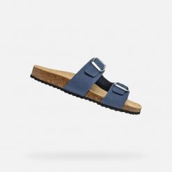 Sandały GEOX D BRIONIA Niebieski. Niebieskie sandały damskie Geox, bez wzorów, ze skóry, bez obcasa. Za 204.99 zł.