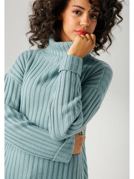 Aniston Golf w kolorze błękitnym rozmiar: 40. Niebieskie golfy damskie Aniston, bez wzorów, ze splotem, bez ramiączek. Za 47.82 zł.