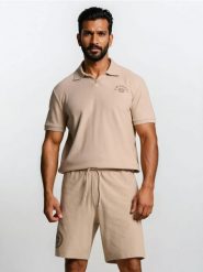 Bawełniane szorty z nadrukiem Smiley - beżowy. Brązowe szorty męskie Sinsay, bez wzorów, z bawełny. Za 39.99 zł.