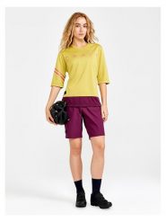 Craft Koszulka kolarska "Core Offroad" w kolorze żółto-ciemnofioletowym rozmiar: M. Różowe bluzki sportowe damskie Craft, m, bez wzorów, z materiału, bez ramiączek. Za 100.99 zł.