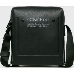 Calvin Klein - Saszetka. Czarne saszetki męskie CALVIN KLEIN, z materiału. W wyprzedaży za 199.90 zł.