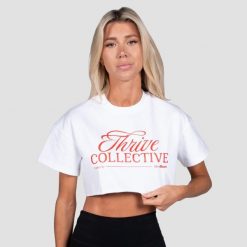 Koszulka damska fitness oversize biała Thrive Cropped. Białe bluzki sportowe damskie GYMBEAM, m, bez wzorów, z bawełny, bez ramiączek. Za 80.90 zł.