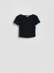 Krótki t-shirt w groszki - czarny. Czarne t-shirty damskie Reserved, l, bez wzorów, z dzianiny, bez kołnierzyka. Za 49.99 zł.