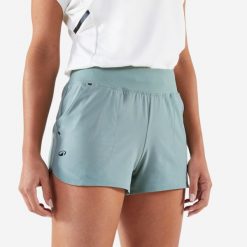 Spodenki do tenisa damskie Artengo Light. Zielone szorty damskie KUIKMA, bez wzorów, z materiału, sportowe. Za 59.99 zł.