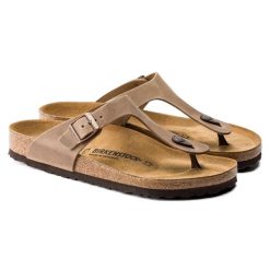 Damskie japonki Birkenstock Gizeh Oiled Leather brązowe wąskie 943813. Brązowe klapki damskie Birkenstock, bez wzorów, z materiału, bez obcasa. Za 569.45 zł.