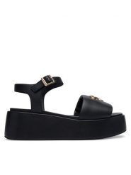 LOVE MOSCHINO Sandały JA16127I0OIA0000 Czarny. Czarne sandały damskie Love Moschino, bez wzorów, z materiału, bez obcasa, na koturnie. Za 939.99 zł.